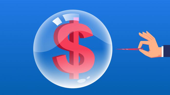 Balloon with a dollar sign being poked with a pin